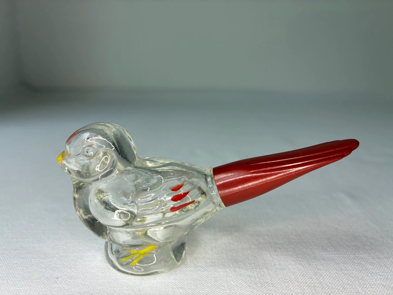 Vintage glazen vogel parfumfles